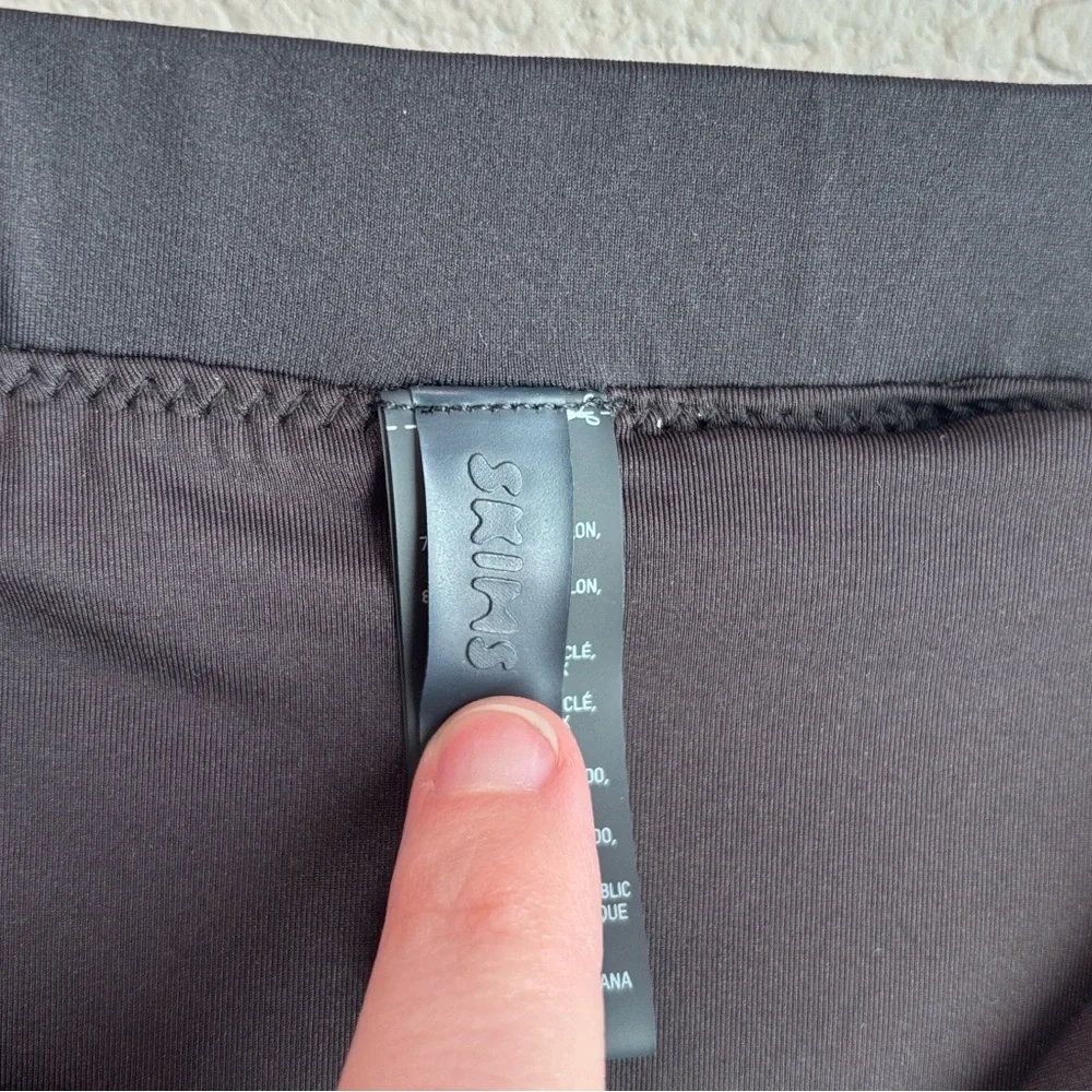 SKIMS Sporty Zipper Swim Stretch Knit Mini Skirt Onyx Black Size Small